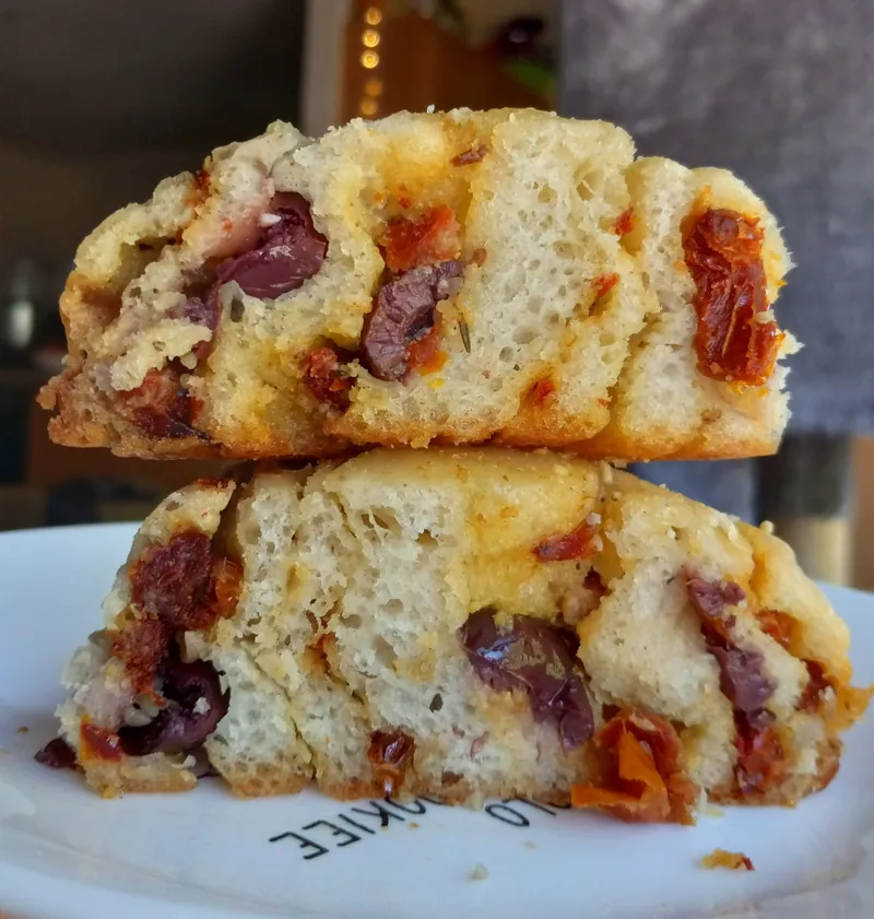 savory rolls with olives and sun-dried tomatoes, cut and stacked